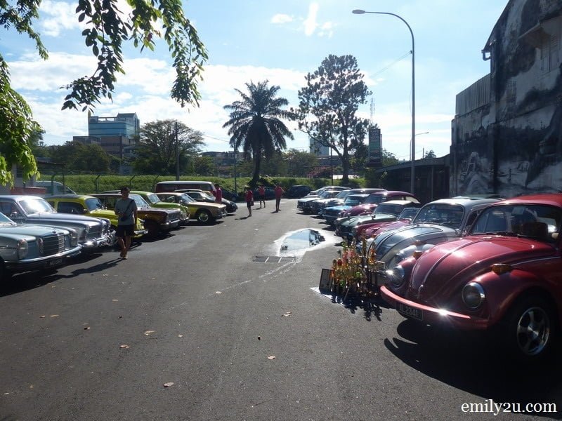 8. two rows of classic cars at the gathering