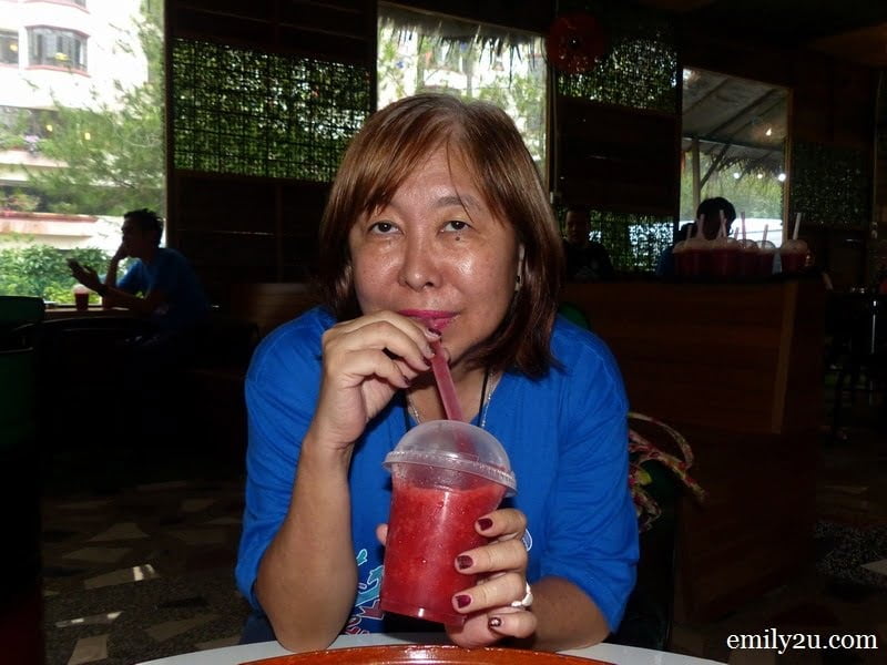 12. Laura enjoys her strawberry juice
