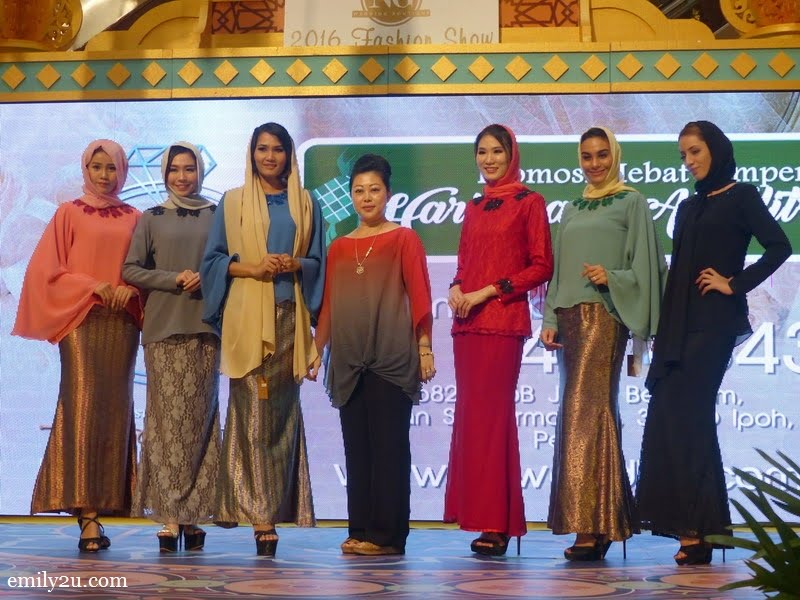 12. designer Angie Ng in the middle, flanked by her six beautiful models
