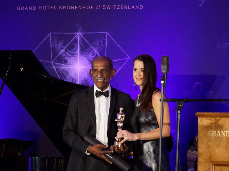 The Tourism Adviser Malaysia for Switzerland, Datuk Jeffery Sandragesan (L), receives the two awards on behalf of The Haven at a gala ceremony in Switzerland