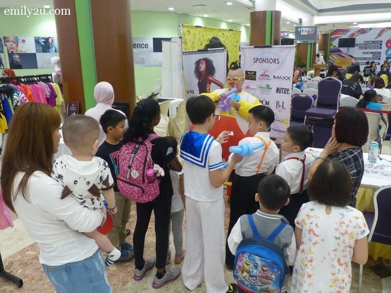 2. Au Young the Clown is a big hit with the children wherever he goes