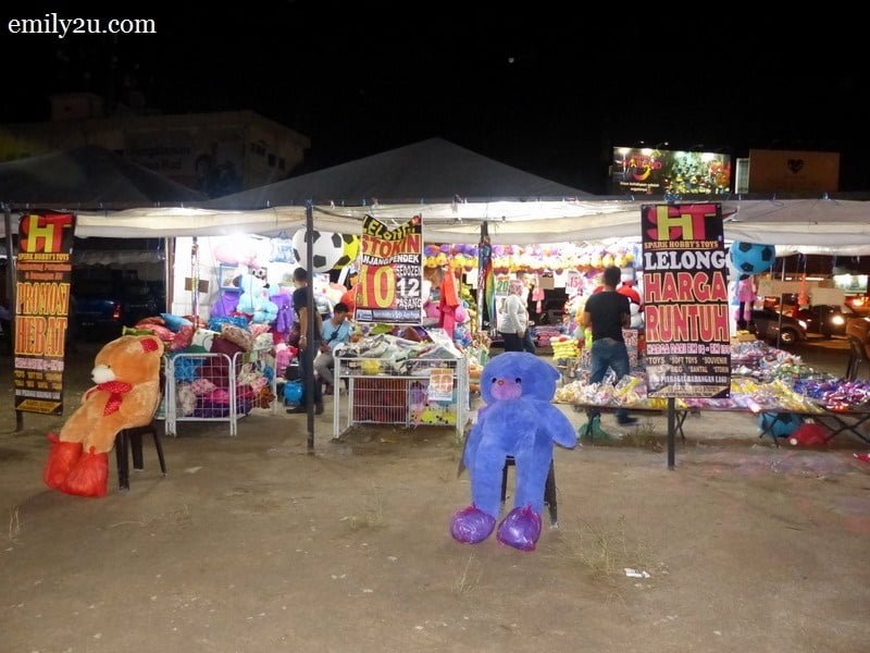 13. one of the few non-food stalls that sells children's clothes and toys