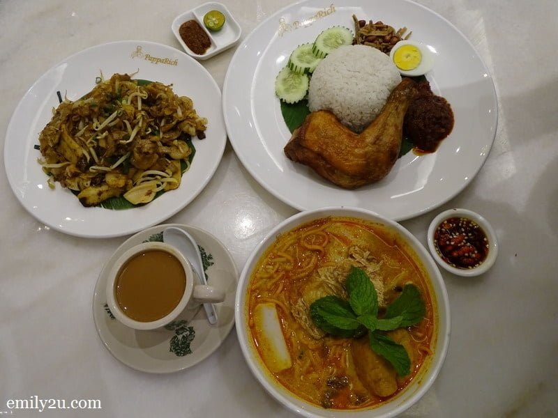 clockwise from left: Char Kway Teow Special, Nasi Lemak with Fried Chicken, Curry Laksa Special & Cham (hot)
