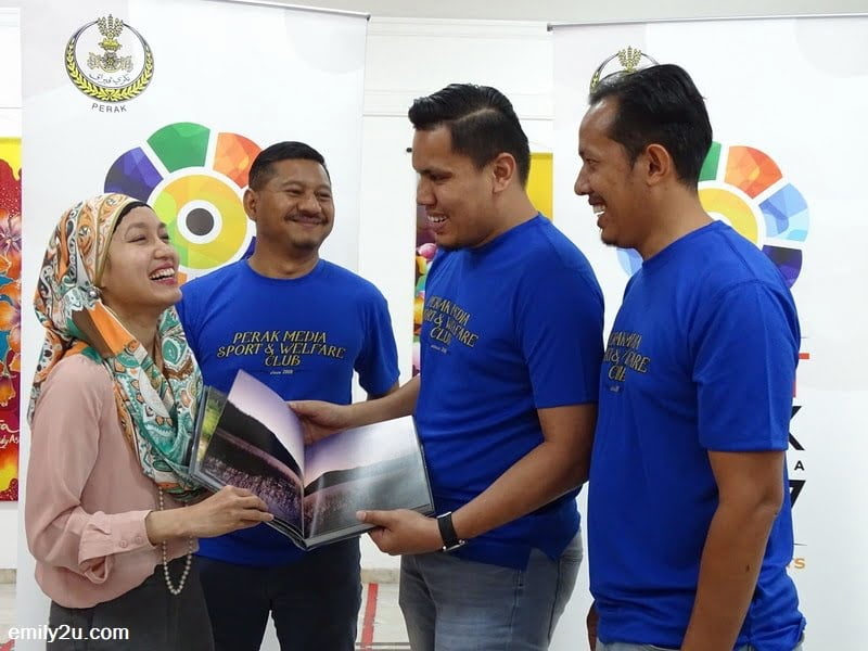  8. a hardcover book on Royal Belum as a gift to the Embassy, presented by an officer from Tourism Perak, Adnan Sulaiman (2nd from R)