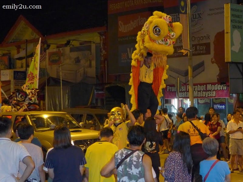 6. lion dance through the streets of Ipoh