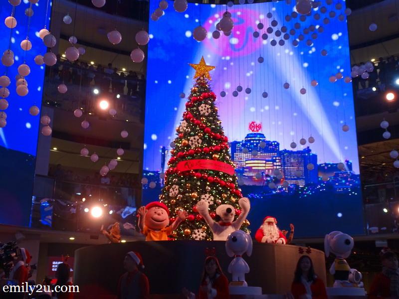 5. a 20-foot tall Christmas tree rises from beneath the stage, accompanied by the Peanuts gang, Santa Claus and his elves