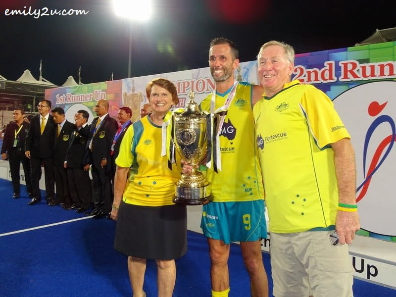 9. Birthday Boy, Mark Knowles, and his parents take a photo with the Sultan Azlan Shah Cup - his fifth title and final outing at the tournament prior to retirement from international hockey
