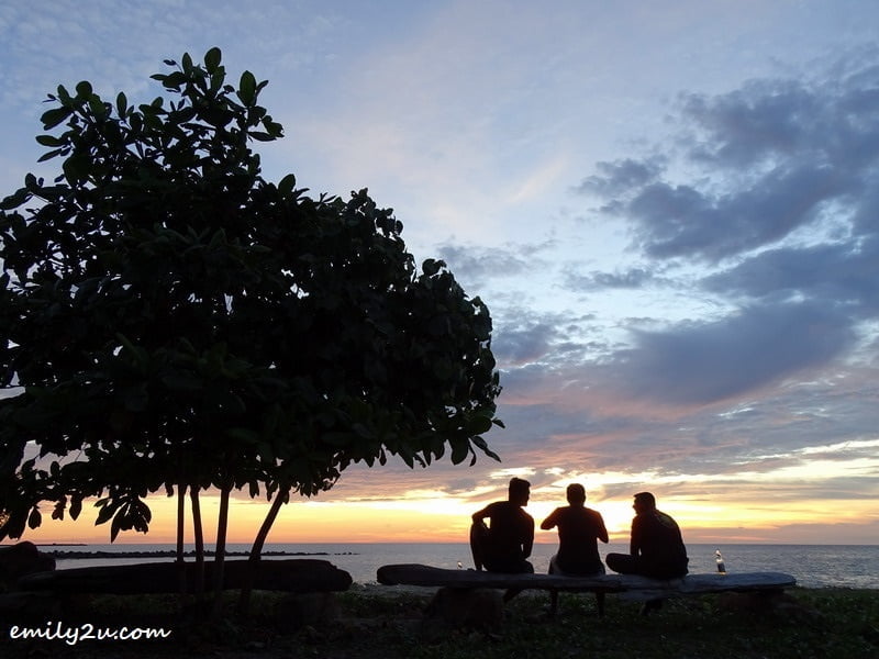 18. three buddies enjoy the sunset on the private beach of Palm Beach Resort & Spa