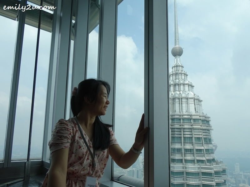 yours truly view the Petronas Twin Towers, Kuala Lumpur, Malaysia
