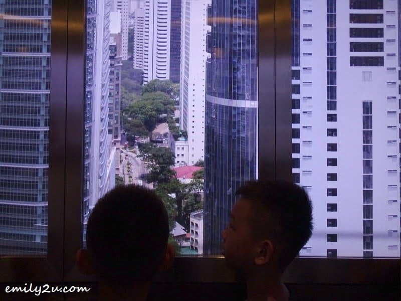  3. in the high-speed elevator, where I had expected to have an ascending view, but disappointingly, it was a screen