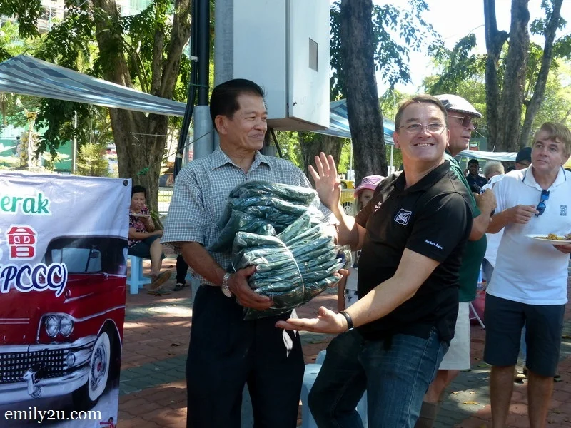 11. Mr. David Lacey reciprocates with MSVCR (Northern Region) club polo shirts