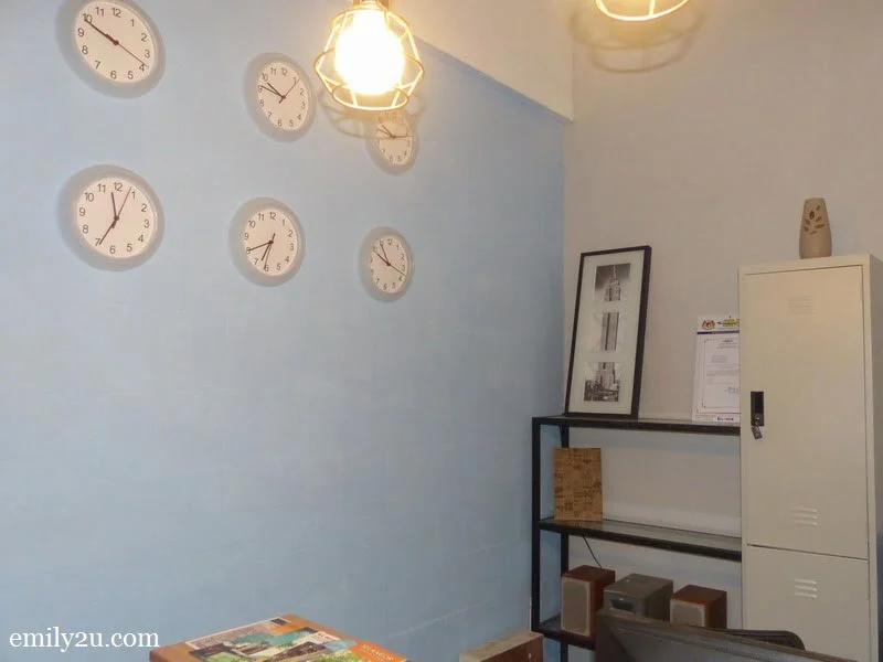 2. clocks that show the time for different world cities at the reception counter