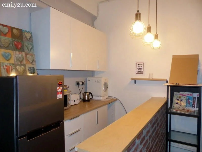 6. pantry equipped with a refrigerator, water dispenser, microwave oven and more