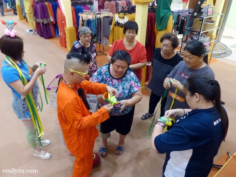 3. a group of women is also interested to learn the art of weaving ketupat