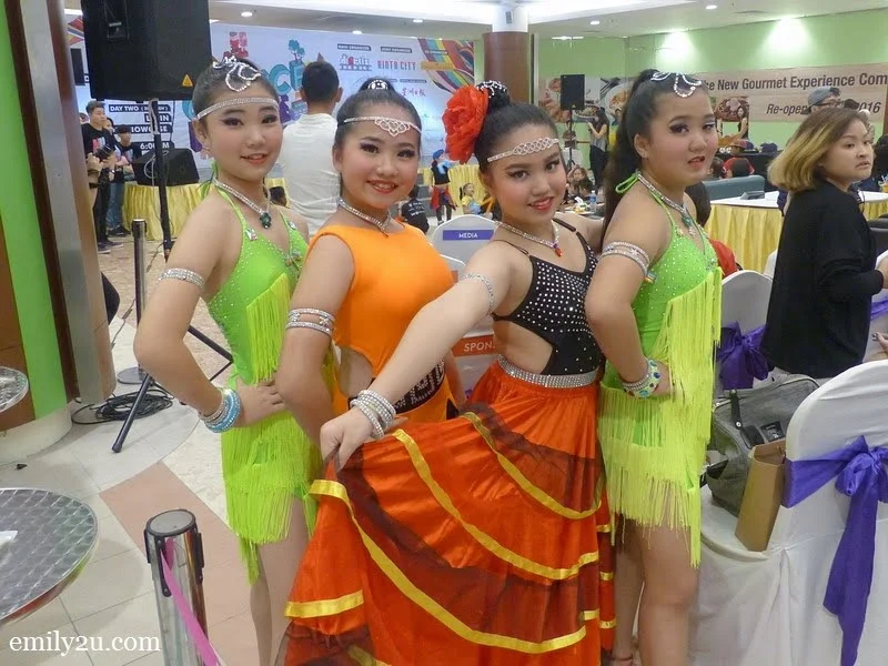 10. young Latin dancers wait for their turn on the stage
