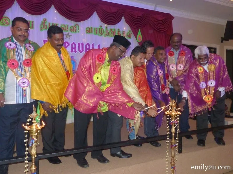 6. opening ceremony by lighting a pair of oil lamps