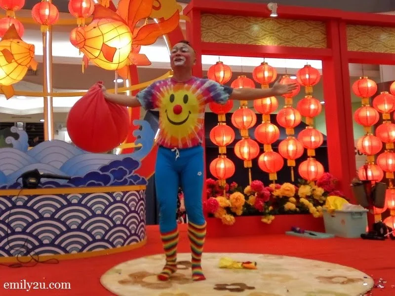 7. Au Young emerges from the giant balloon