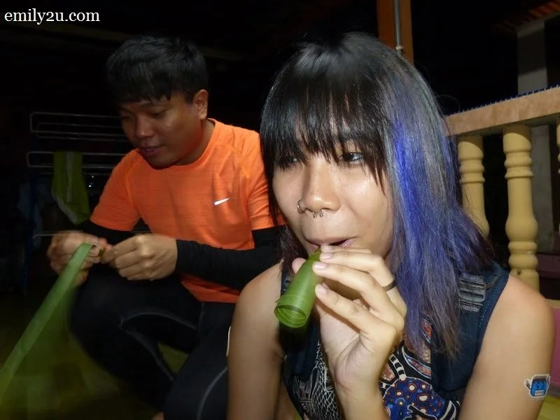 7. Ynez Wahab blows the coconut palm whistle