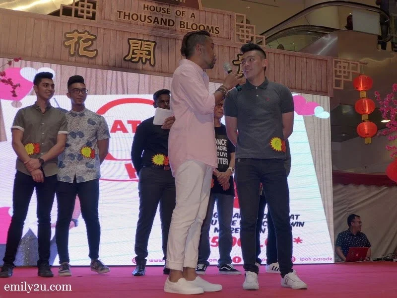 7. being interviewed by emcee Baki Zainal