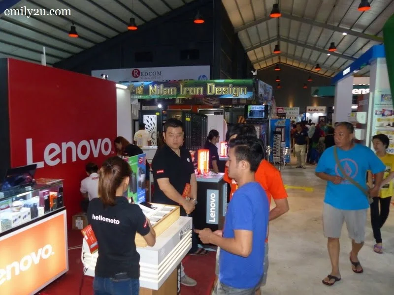 8. interested shoppers at the Lenovo booth