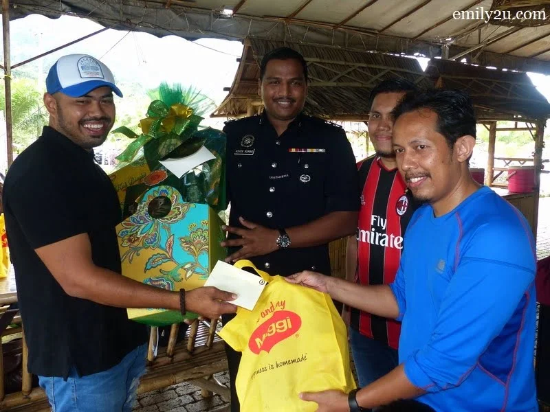 11. Fareez of TV3 (L) wins the karaoke competition