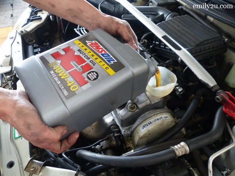 7. pour in the Amsoil 10w40 XL Series fully synthetic engine oil