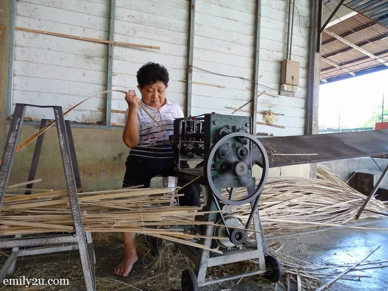 1. Madam Lau Weng Thye busy shaving bamboo strips