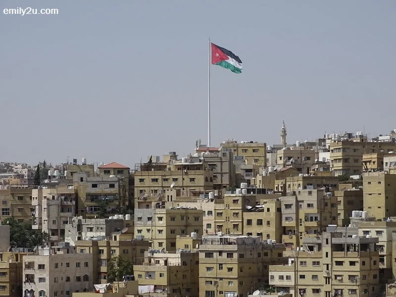 1. an unobstructed view of Raghadan Flagpole, the largest flag and tallest flagpole in the world, from Amman Citadel