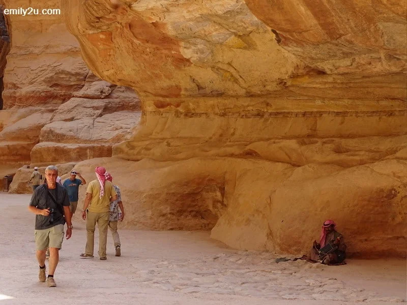 13. a busker in Petra