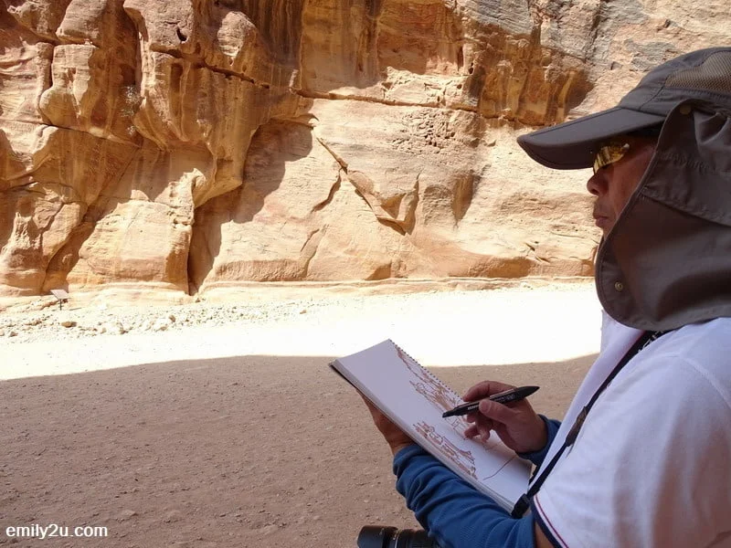 24. a visitor from Hong Kong seals his memory of Petra with a sketch