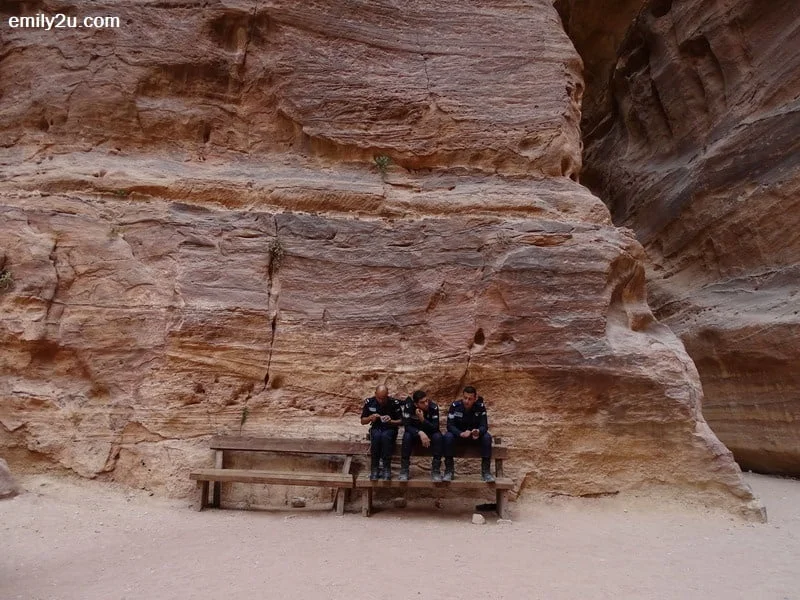 27. tourist policemen taking a break