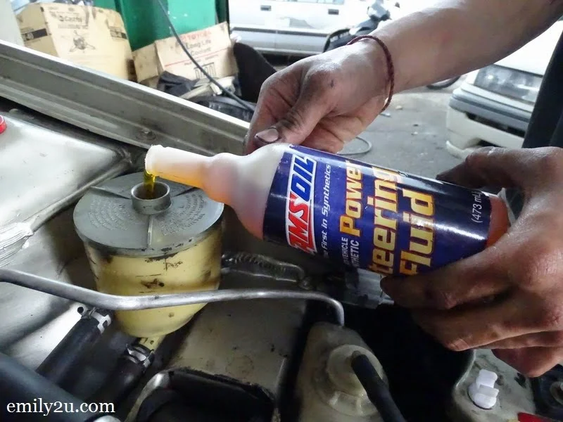 3. filling with new Amsoil Power Steering Fluid