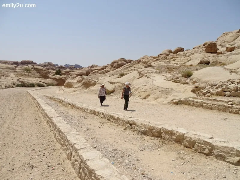 4. visitors trekking back to the entrance as I enter the site