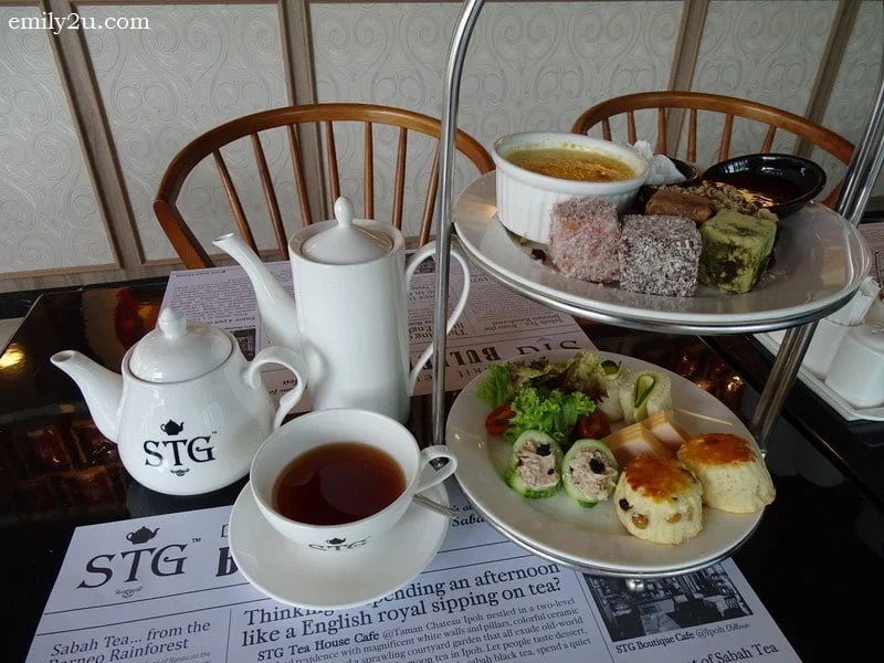 9. Afternoon tea set for two - finger sandwiches, freshly baked scones with homemade strawberry jam & cream, miniature desserts + choice of Sabah tea or coffee