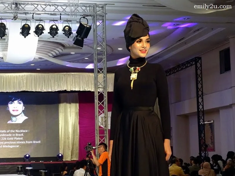 11. a necklace by Mona Shroff Jewellery Hong Kong is paraded at the start of the auction - it fetched RM7000