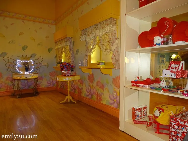  12. Hello Kitty House with shelves filled with Hello Kitty collectibles