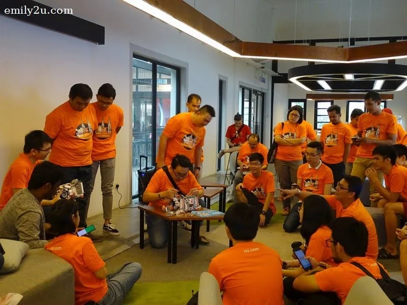 16. fans hard at work trying to figure out which part fits the MITU Builder