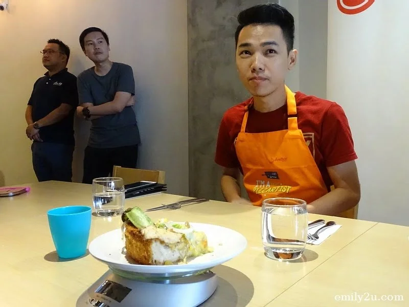 14. Sky has his plate weighed at the end of the pizza eating challenge