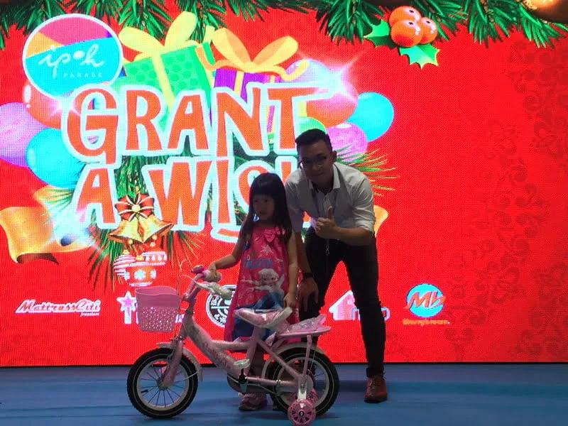 3. a child and her gift of a bicycle