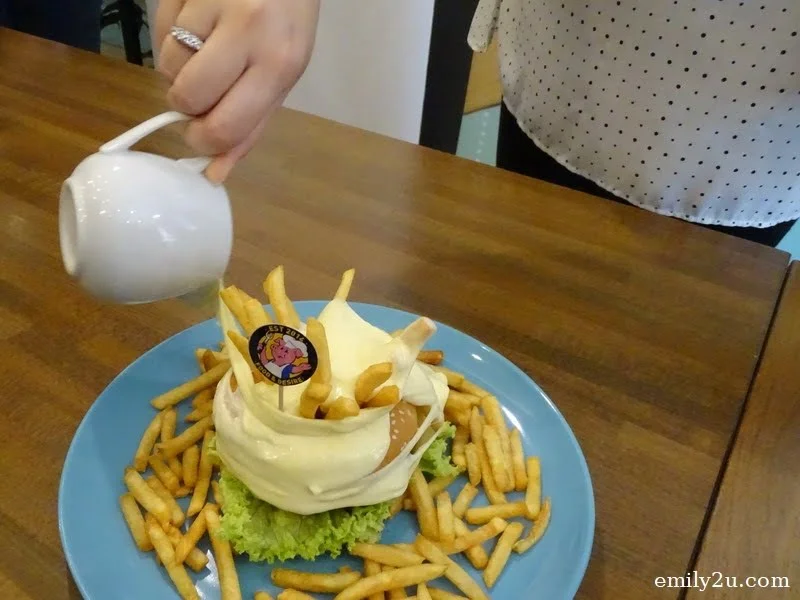 8. The RockStar - handcrafted gourmet pork burger with cheesy-oozy sauce