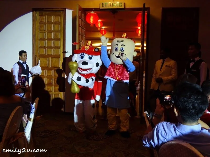 24. the dog mascot makes an appearance for Year of the Dog