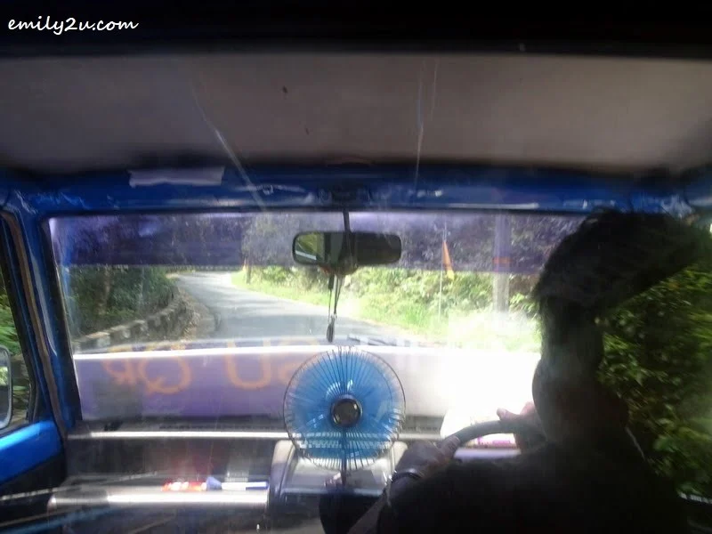 2. winding road uphill on a tuk-tuk