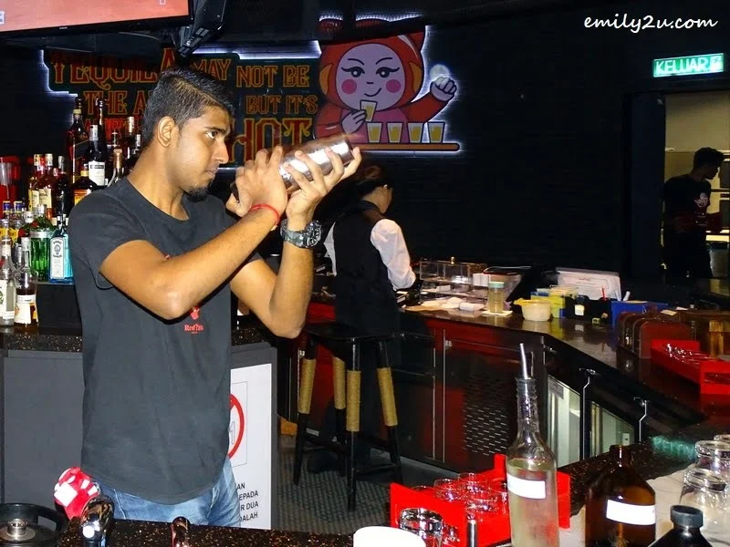 6. bartender struts his stuff