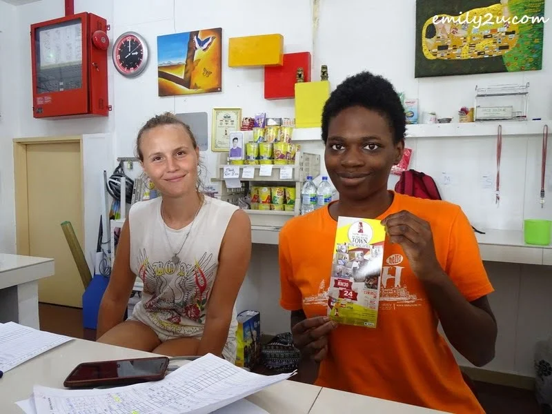 3. volunteers at the reception counter: Pilar (L) and Kemi (R)