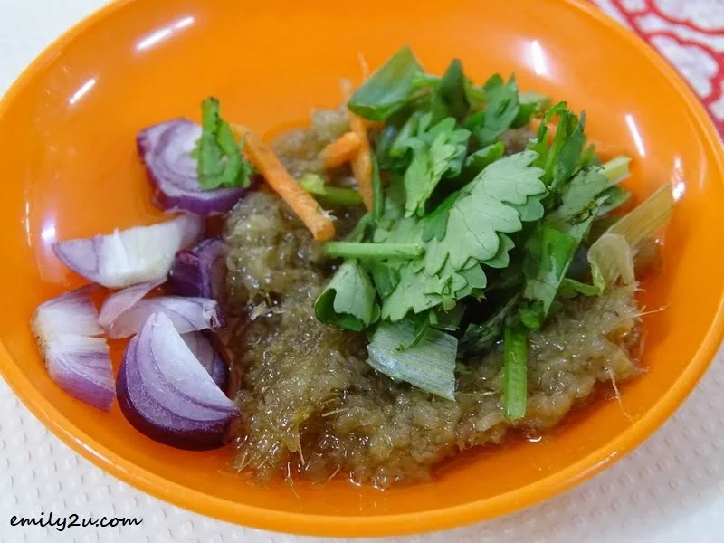  4. dipping sauce of finely chopped ginger and onions topped with coriander leaves