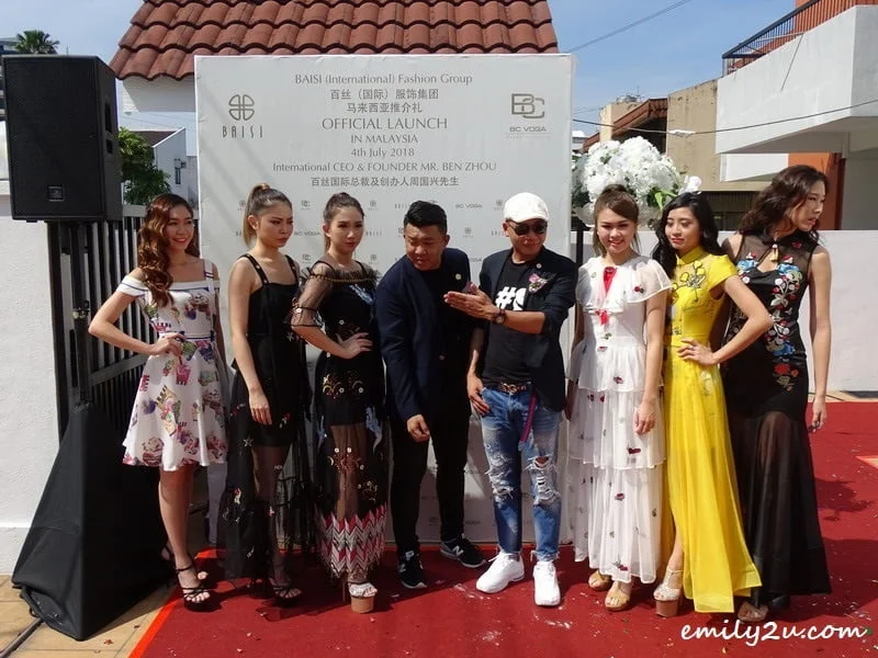26. Mr. Ben Zhou & Mr. Christopher Chong pose with the six models