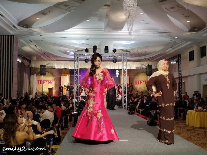 22. IIFW Ambassador Datin Caroline Wong (L) and IIFW adviser YBhg. Datin Seri Dr Nomee Ashikin Mohammed Radzi take to the runway to conclude the gala event