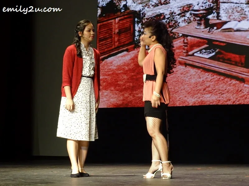 6. Matilda's teacher Miss Honey (L) looks for Matilda's mother