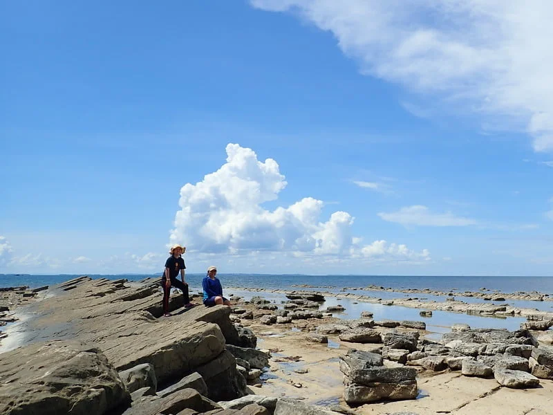 8. Lily (seated) and I, with Brunei far off in the horizon across the sea (photo courtesy of rambleandwander.com)