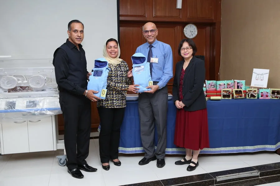  2. handover of Embrace Nest Starter Packs (L-R): Founder & CEO of IIFW™ Mr Louis Sebastian, YBhg. Datin Seri Dr. Nomee (IIFW™ Adviser), Dr. Jayabalan - Head of Paediatric Department.(HRPB) & Pengarah Hospital Raja Permaisuri Bainun Dr. Teo Gim Sian